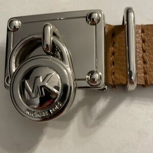 193. Michael Kors faux leather belt with silver MK lock detail on buckle